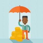 African-american businessman with umbrella as protection for his investment.